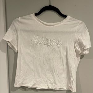 cropped white hollister tee. good condition, size small.